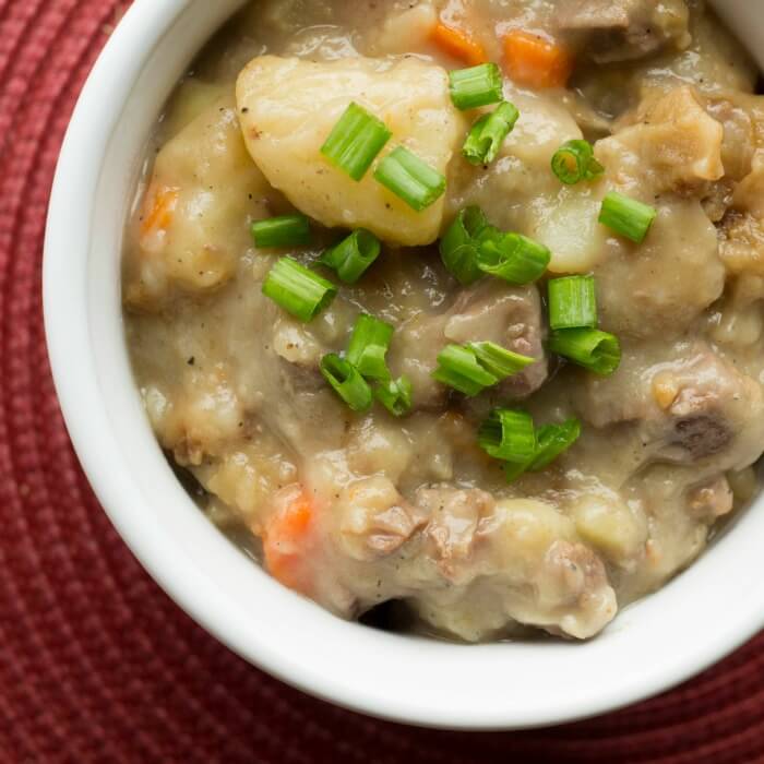 venison stew in a white bowl