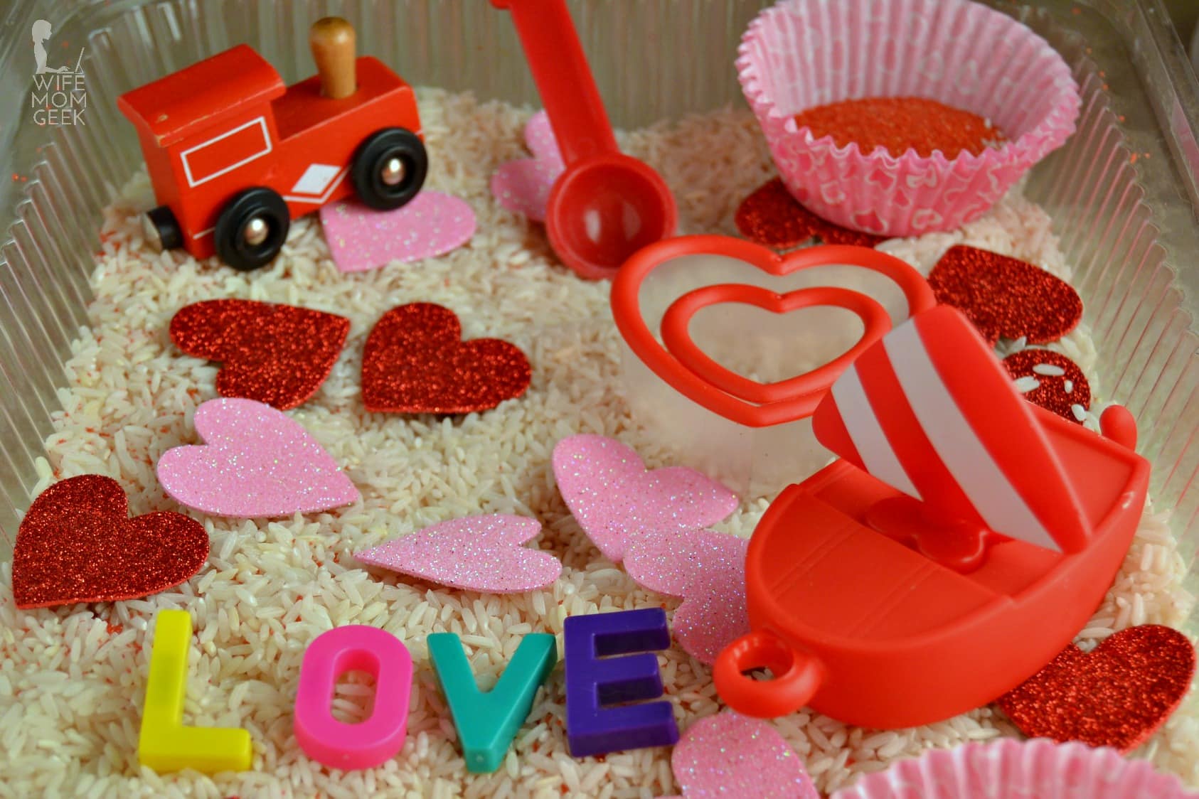 Boat and Train in Valentine's Day Sensory Bin