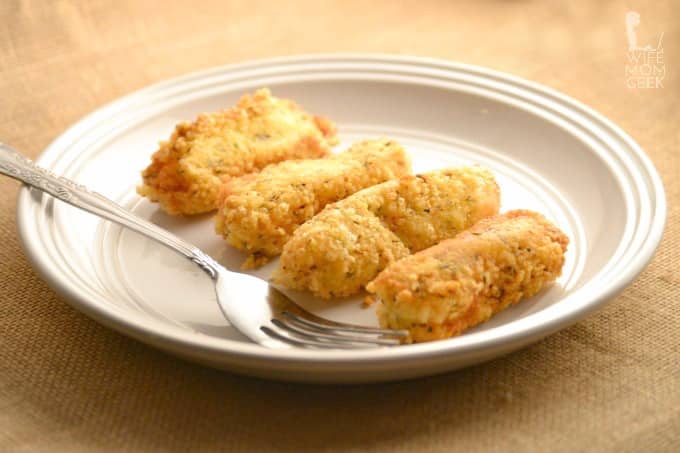 low carb cheesesticks on white plate