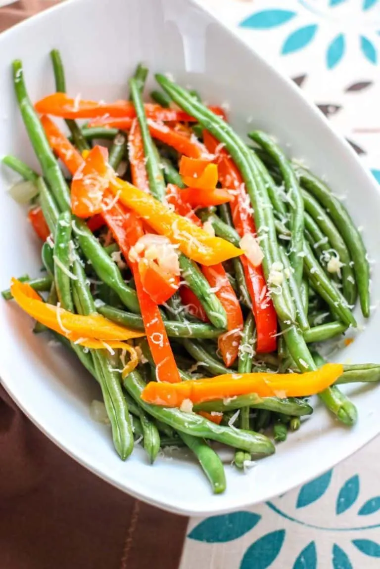 green beans and peppers with sprinkled parmesan