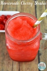cherry slushie in mason jar style glass