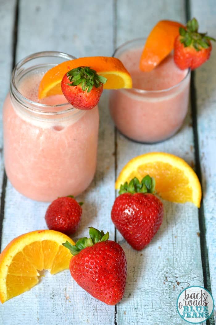 two strawberry orange slushies