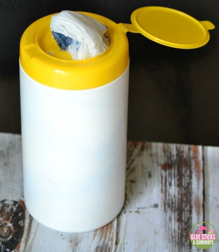 kitchen hack for storing plastic bags in an empty wipes container