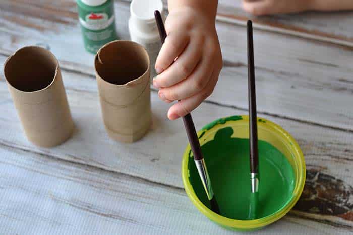 painting toilet paper tubes green