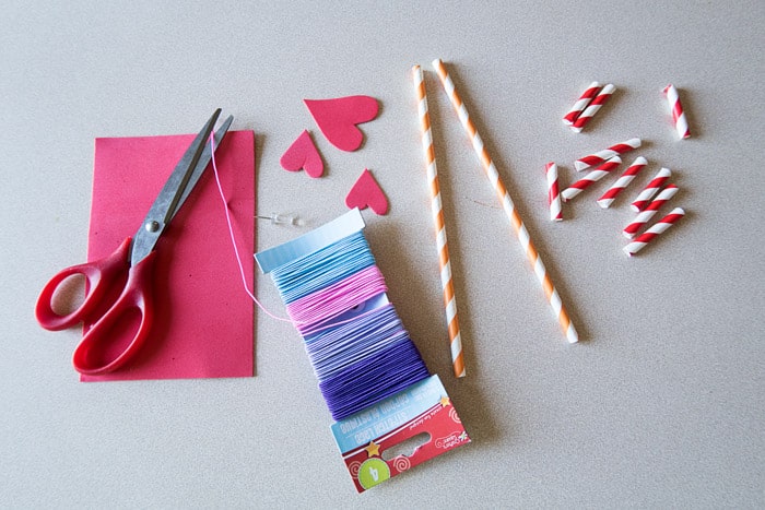 Materials to make heart necklaces for Valentine's Day