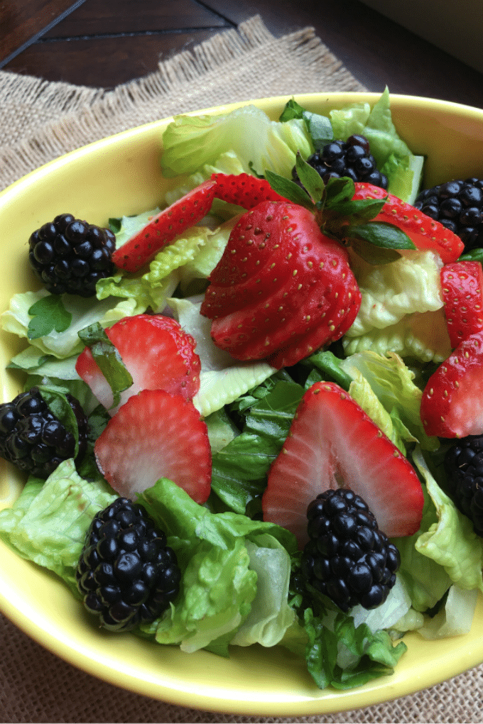 A mixed berry salad is the perfect healthy side for your dinner this spring and summer!