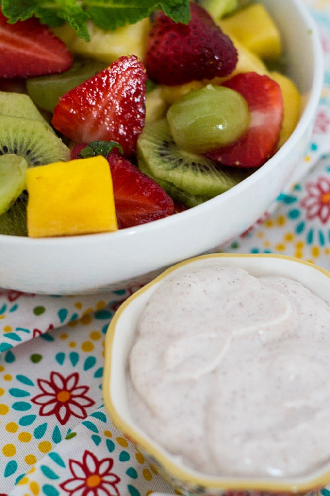 Honey yogurt dip paired with tropical fruit salad