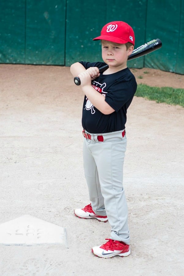son playing baseball
