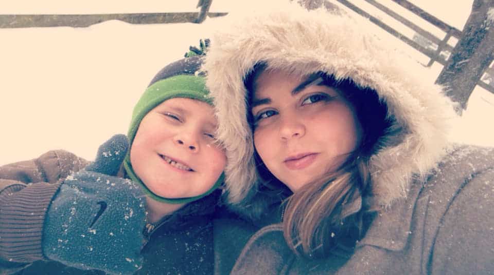 the author of this site, Donella, and her son in the winter snow