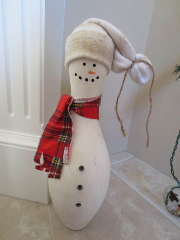 snowman made out of a painted bowling pin