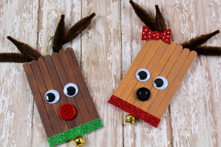 two completed popsicle stick reindeer ornaments