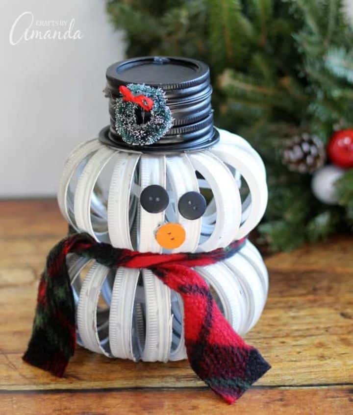 snowman made of painted mason jar lids