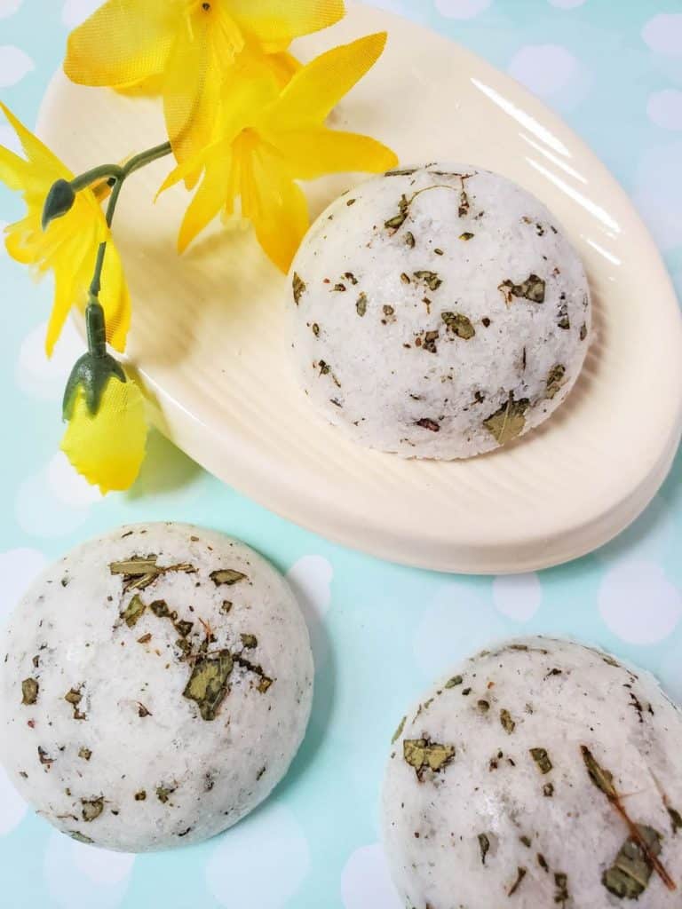 eucalyptus shower melts on light blue background with yellow flowers