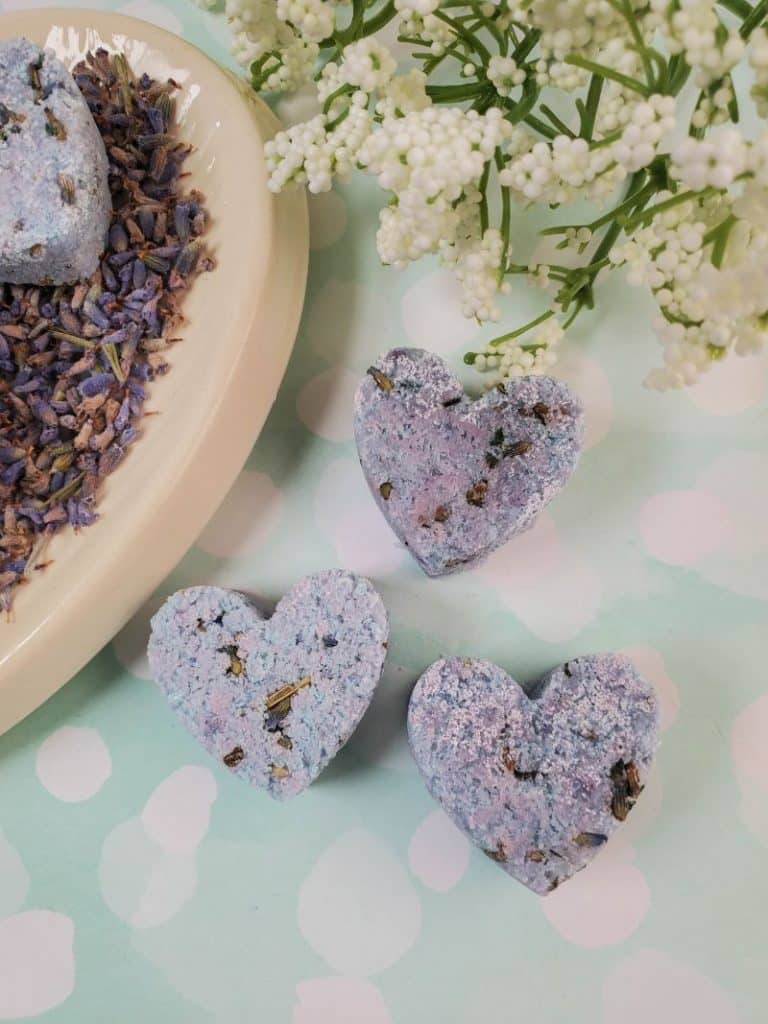 heart-shaped lavender shower melts on a light background