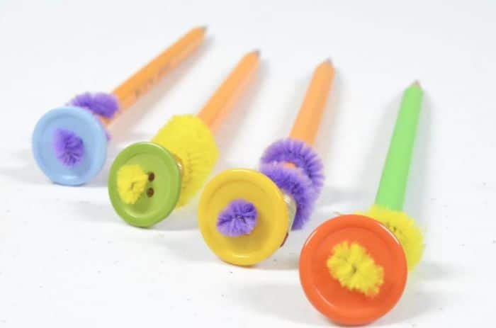 button pencil toppers