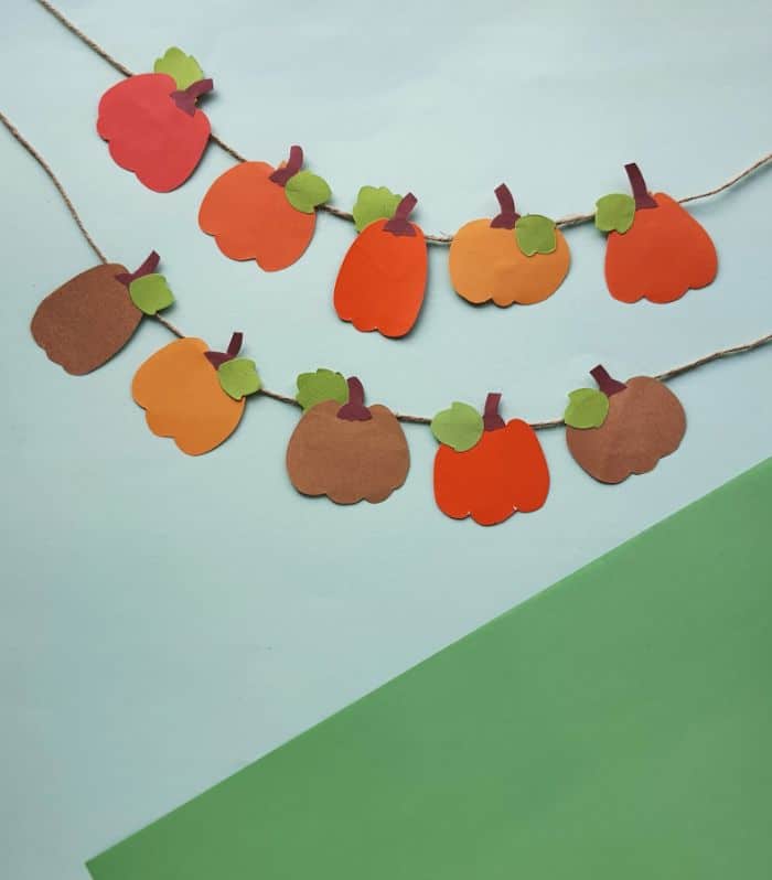 easy paper pumpkin garland made from a printable template and twine