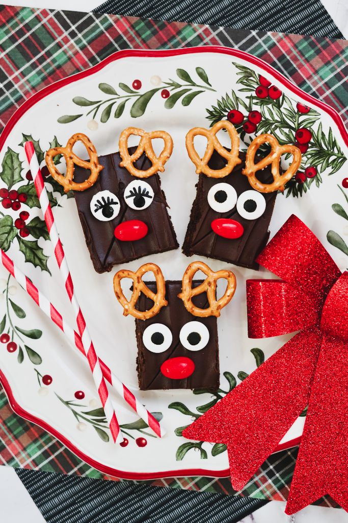 closeup vertical shot of rudolph brownies on a holiday platter