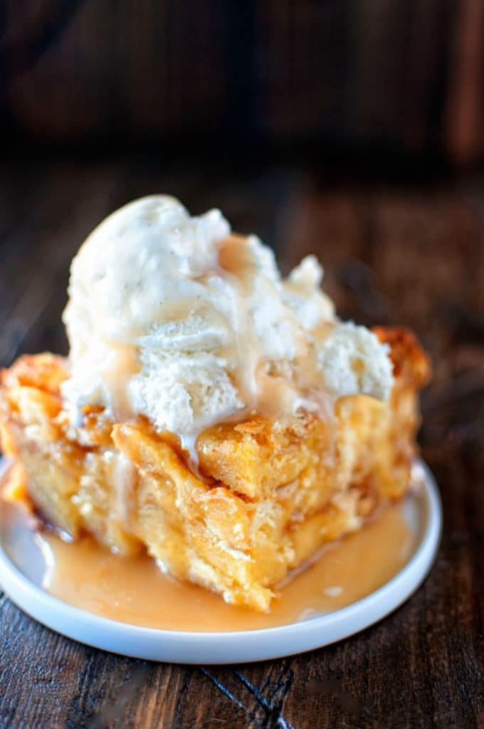 festive eggnog bread pudding topped with ice cream