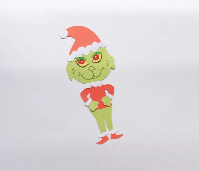 drawing in the details on the Grinch's face