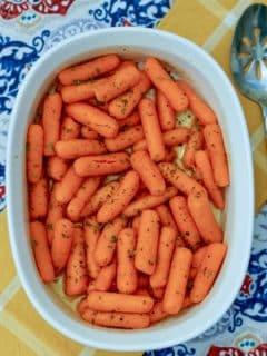 roasted baby carrots in a baking pan