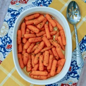 roasted baby carrots in a baking pan