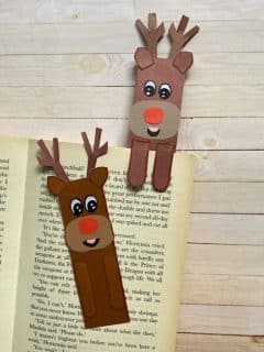 reindeer bookmarks with one on the book and one holding a page