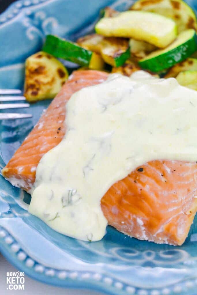 salmon covered in dill sauce