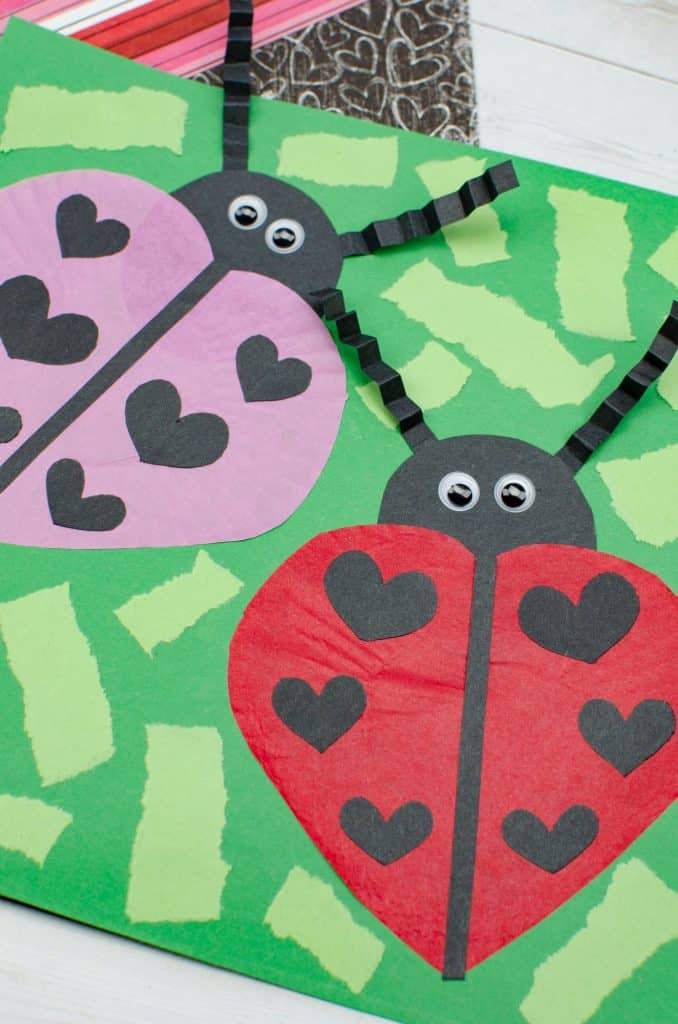 paper grass pieces added to ladybug craft