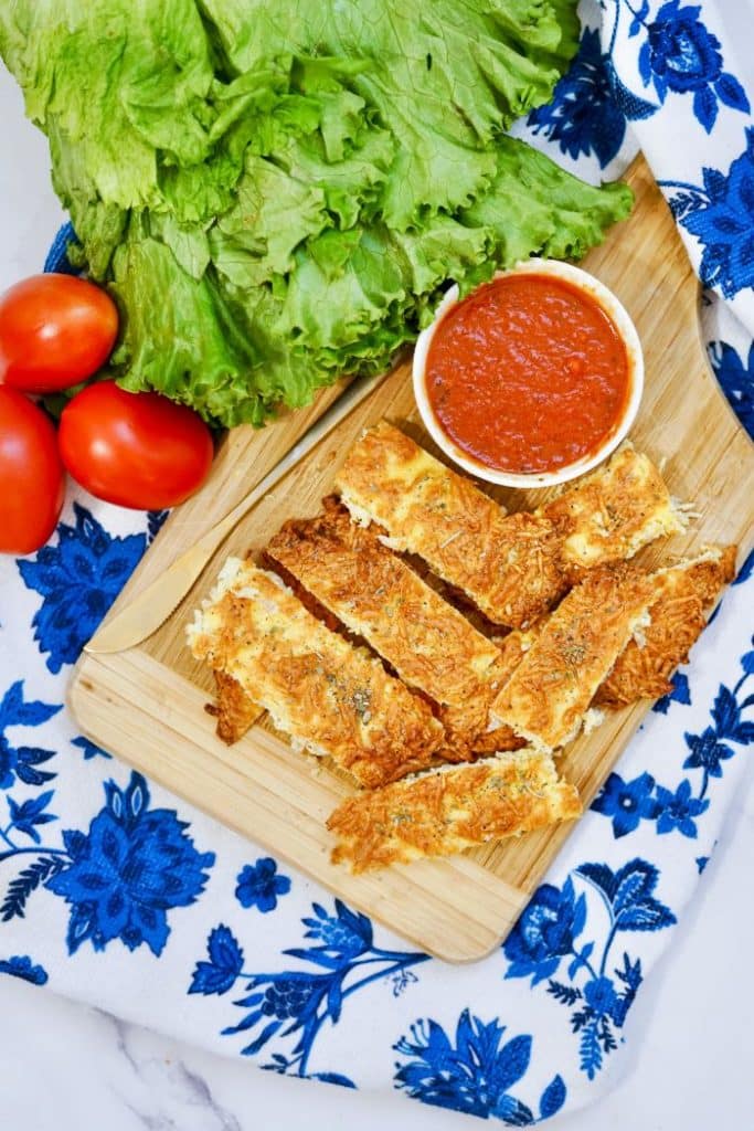 vertical picture of low carb cheesy breadsticks