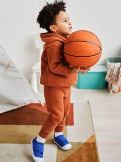 child with basketball