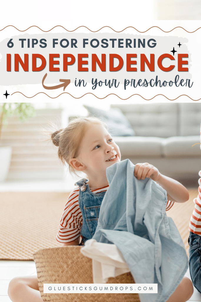 child helping with laundry with text overlay about fostering independence in your preschooler