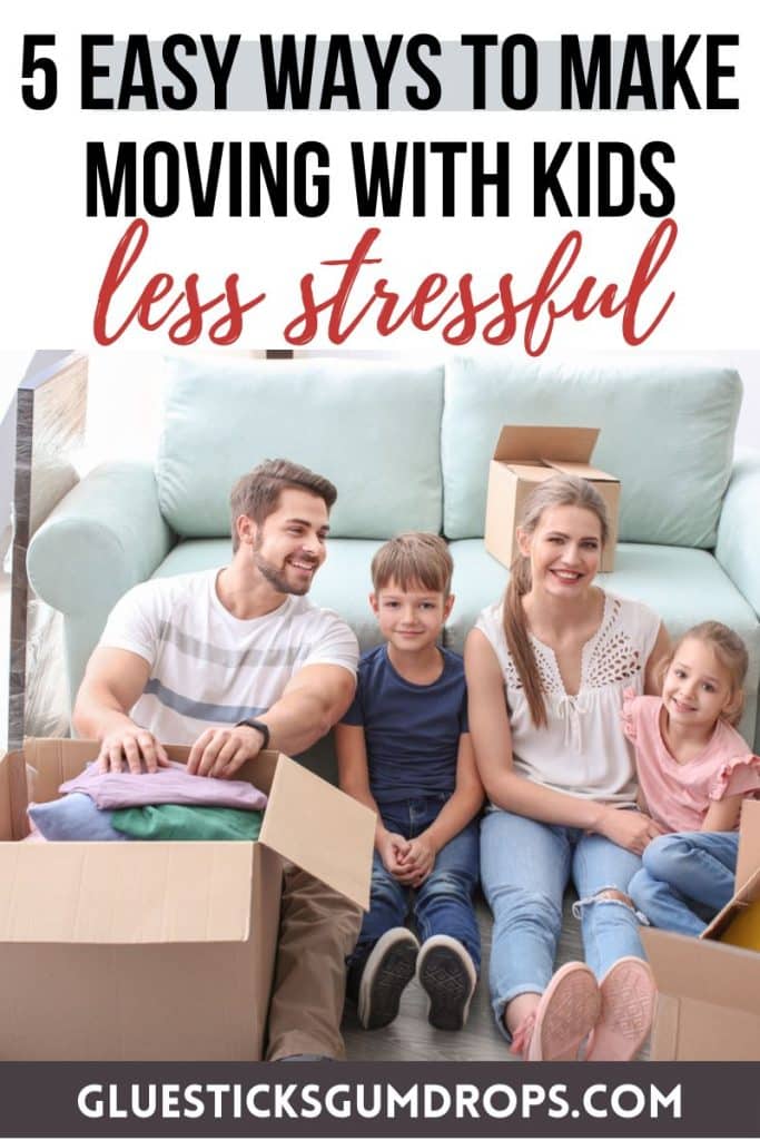 family of four surrounded by boxes after a move