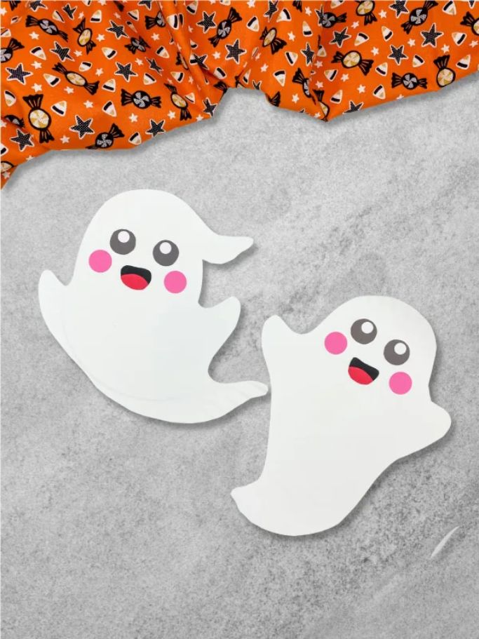 paper plate ghosts on marble background
