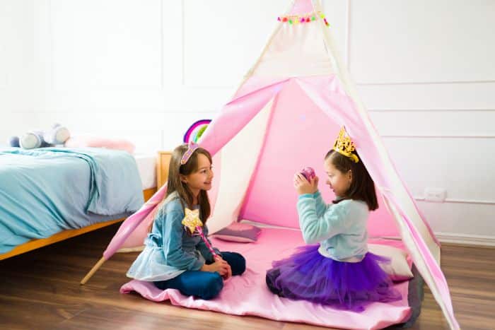 two girls having a playdate with princess theme