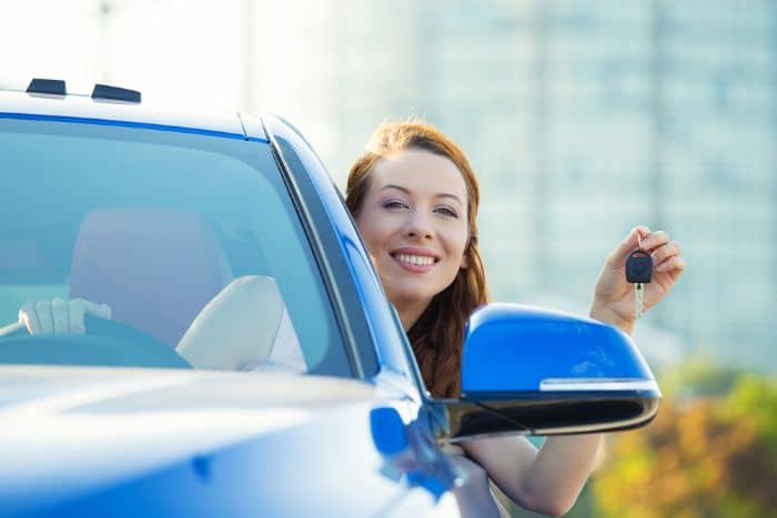 woman in new car