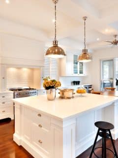 beautiful white kitchen brass details