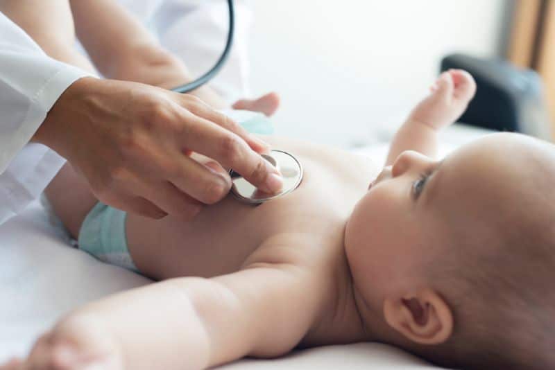 stethoscope held to baby's chest