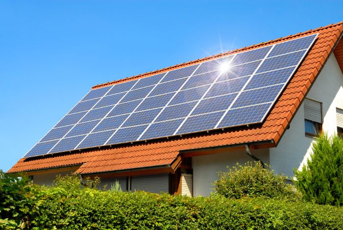 solar solutions - solar panels installed on roof of home