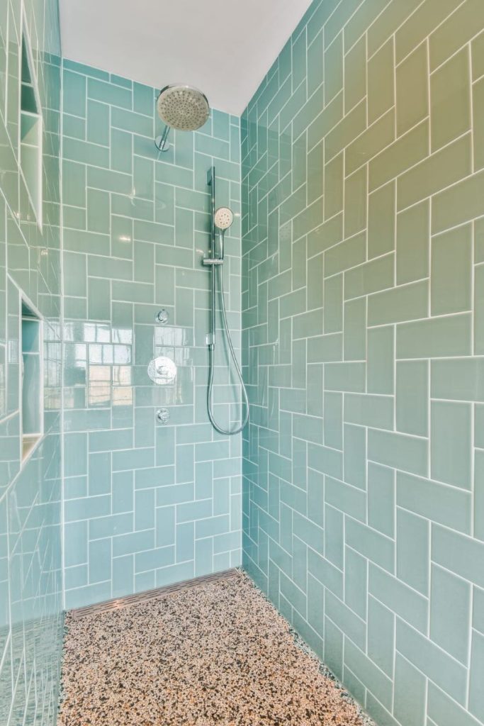 teal subway tile in shower