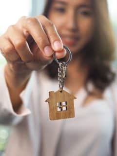 woman with key to home