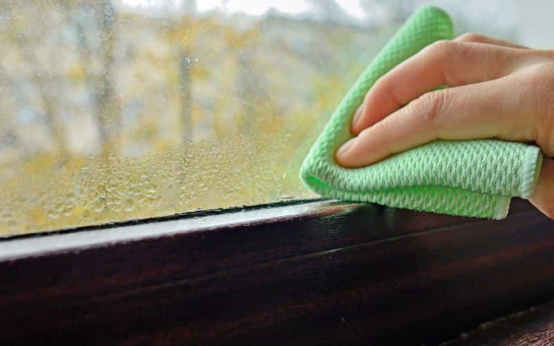 cleaning condensation from a window