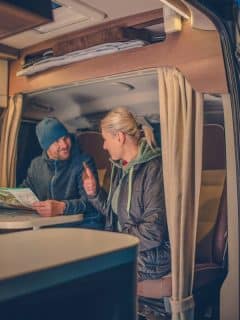 couple in rv camping