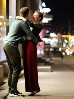 couple on date in city at night
