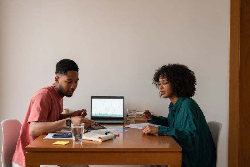 young couple working on budget and finances