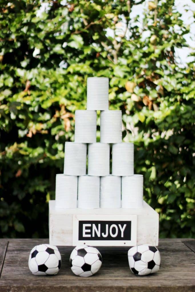 diy game made with painted tin cans and soft mini soccer balls