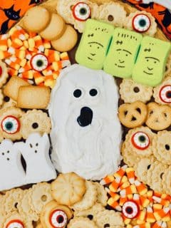 a frosting board with a ghost theme