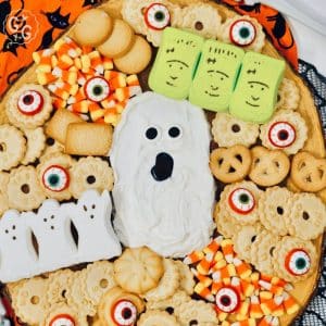 a frosting board with a ghost theme