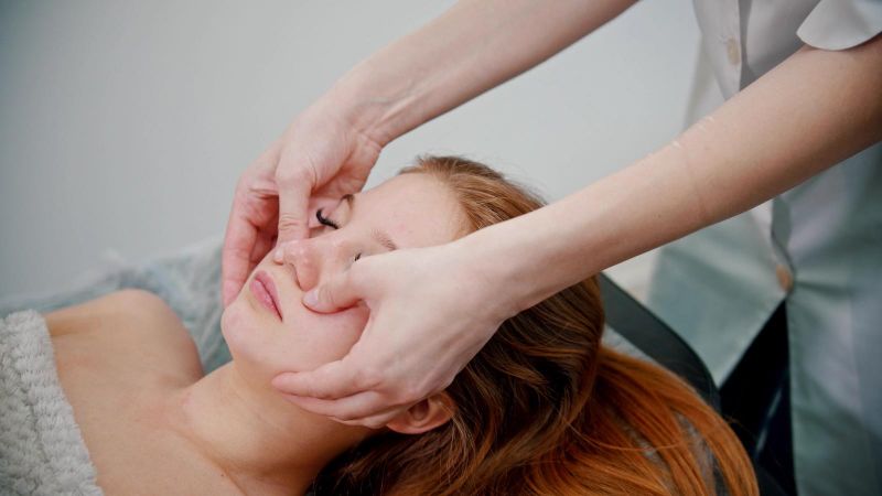 woman getting a facial massage