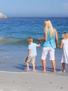 mom and children on the beach