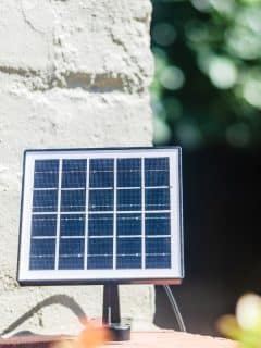 solar panel installed on brick wall